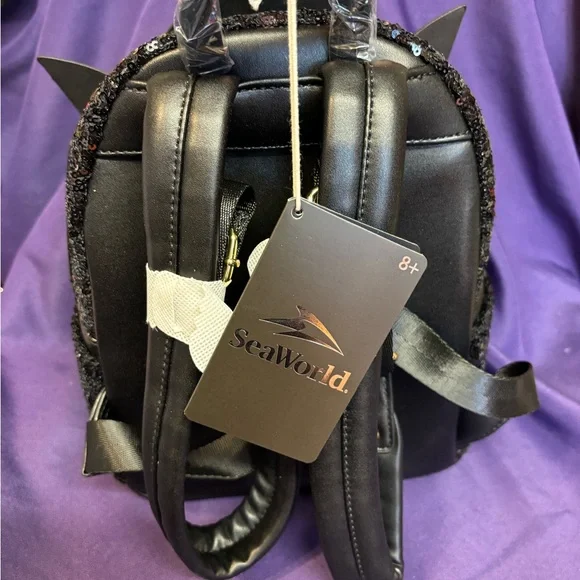 Loungefly Black and Orange Penguin Backpack Sparkly Design - Picture 3 of 4